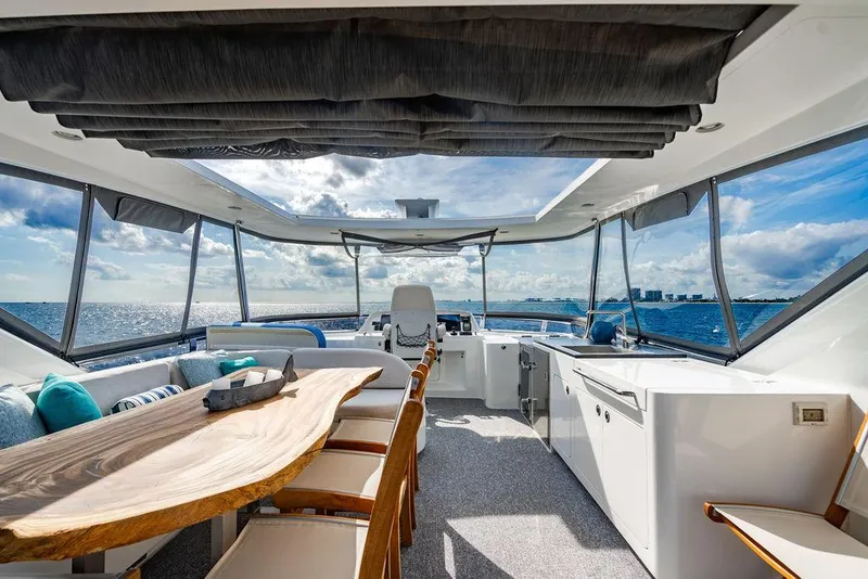 Slide: The Image of Luxurious interior of 2013 Custom 73 Lanzarote yacht with ocean view and elegant seating. - 35