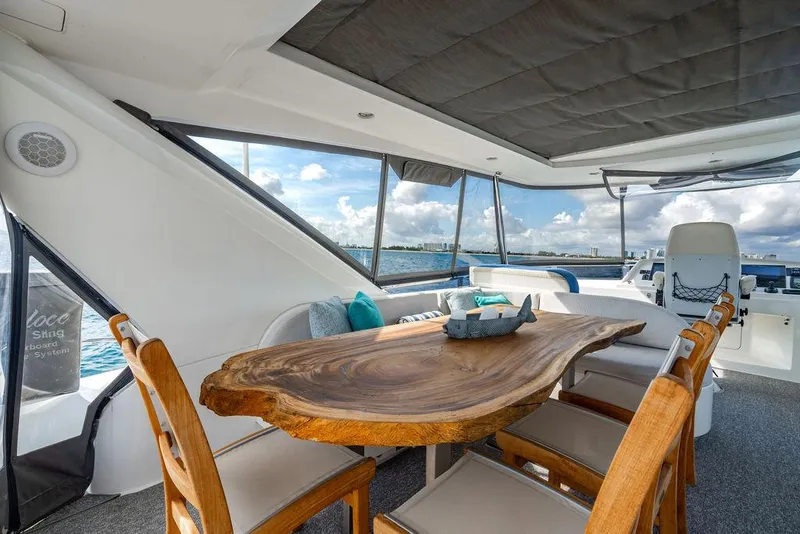 Slide: The Image of Luxurious interior of 2013 Custom 73 Lanzarote yacht with wooden table and ocean view. - 37