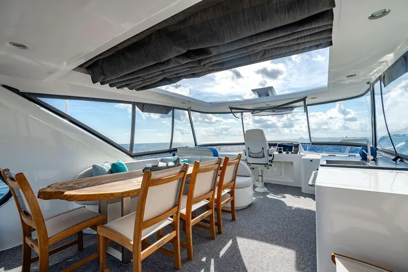 Slide: The Image of Luxurious interior of 2013 Custom 73 Lanzarote yacht with ocean view and elegant seating. - 38