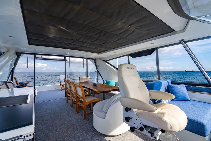Slide: The Image of Luxurious interior of 2013 Custom 73 Lanzarote yacht with ocean view and elegant seating. - 41
