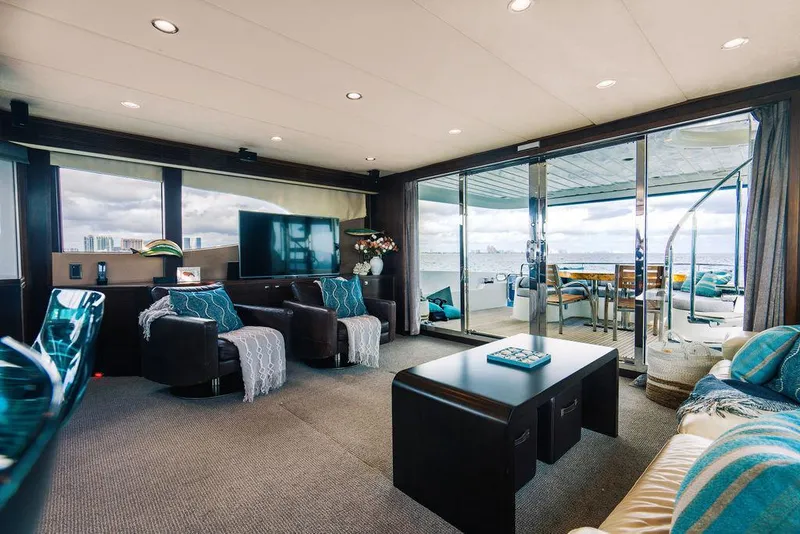 Slide: The Image of Luxurious yacht interior with modern decor, featuring ocean views through large windows. - 59