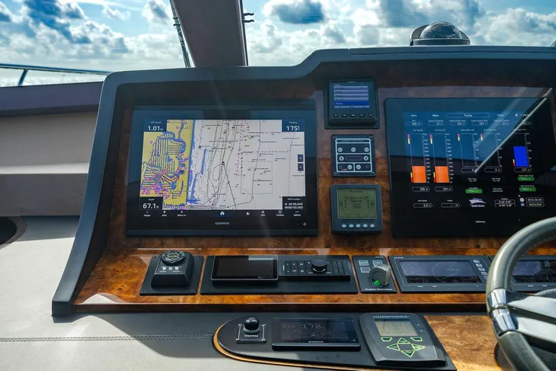 Slide: The Image of Cockpit of 2013 Custom 73 Lanzarote yacht with advanced navigation and control systems. - 76