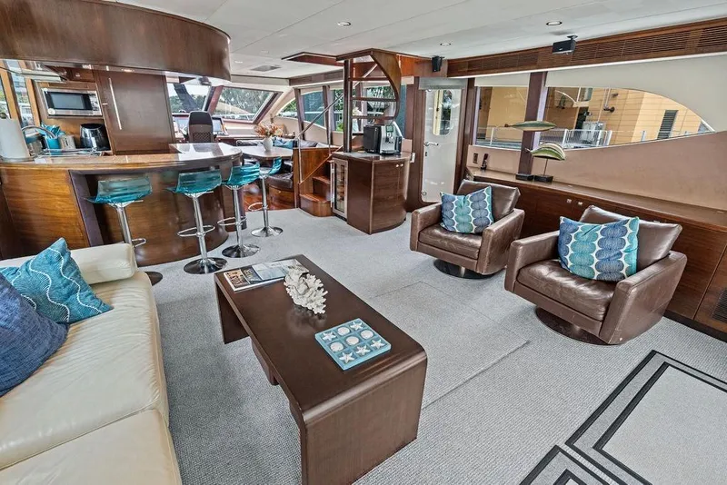 Slide: The Image of Luxurious interior of 2013 Custom 73 Lanzarote yacht with modern seating and bar area. - 63