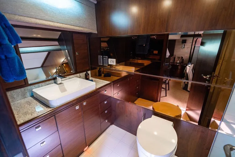 Slide: The Image of Luxurious yacht bathroom with modern fixtures, wooden cabinetry, and elegant design, 2013 Custom 73 Lanzarote. - 89