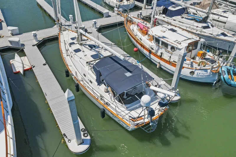 Slide: The Image of Aerial view of a 2009 Pasport 51 yacht docked at a marina. - 2