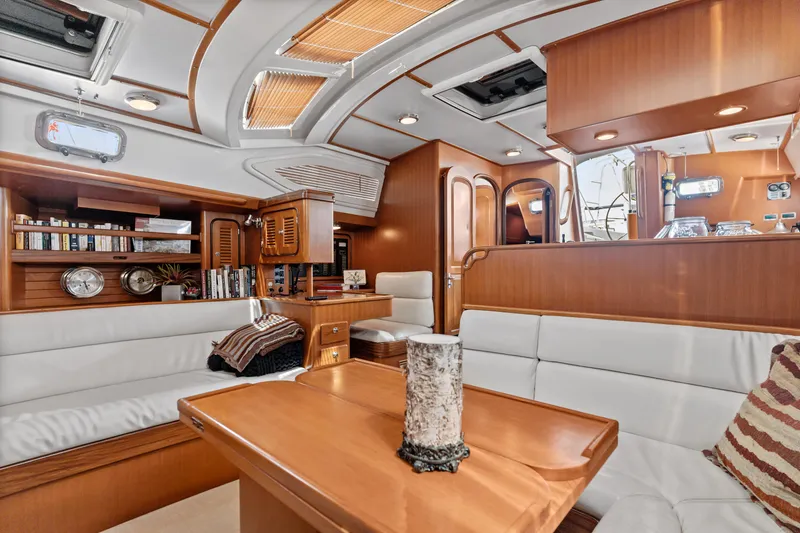 Slide: The Image of Luxurious interior of 2009 Pasport 51 yacht with wood finish and comfortable seating. - 29