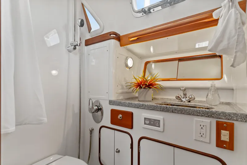 Slide: The Image of Luxurious 2009 Pasport 51 yacht bathroom with modern fixtures and elegant design. - 30