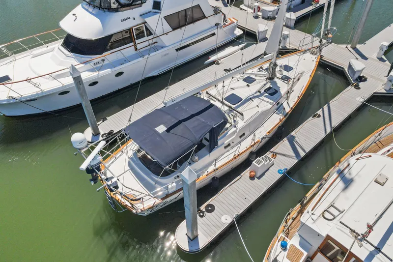 Slide: The Image of Aerial view of a 2009 Pasport 51 yacht docked at a marina. - 42
