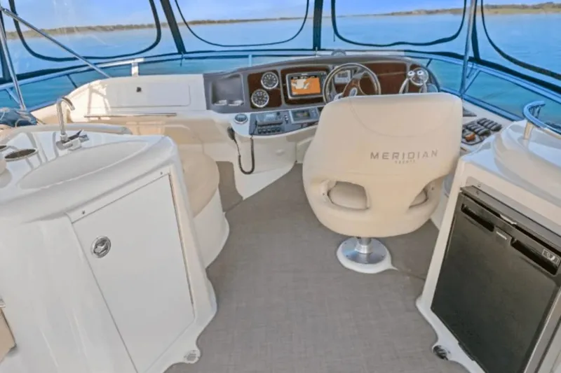 Slide: The Image of Interior of a 2013 Meridian 391 Sedan yacht with helm station. - 41