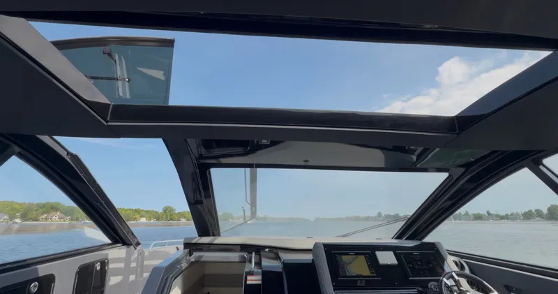 Slide: The Image of Interior view of 2023 Cruisers Yachts 42 GLS on the water. - 18