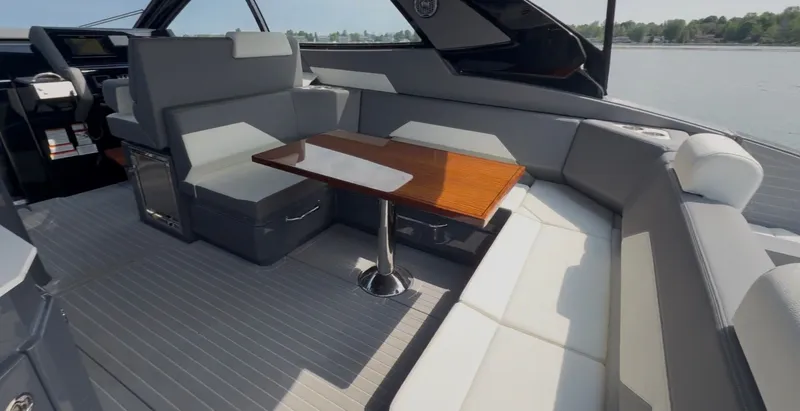 Slide: The Image of Interior of 2023 Cruisers Yachts 42 GLS with elegant seating area. - 20