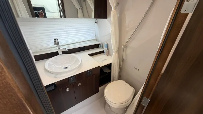 Slide: The Image of 2023 Cruisers Yachts 42 GLS bathroom with sink and toilet. - 21