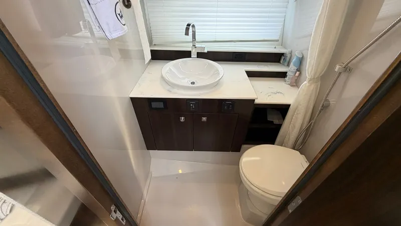 Slide: The Image of Luxurious bathroom in the 2023 Cruisers Yachts 42 GLS. - 22