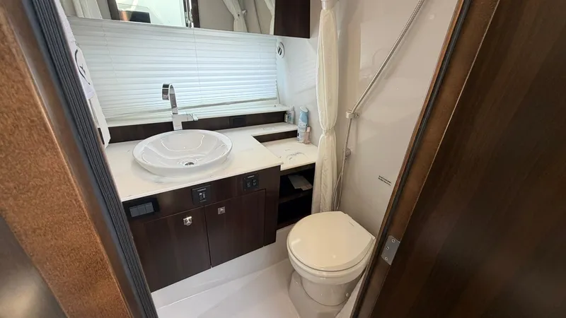 Slide: The Image of Luxurious bathroom in the 2023 Cruisers Yachts 42 GLS. - 23