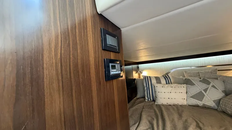 Slide: The Image of Interior of 2023 Cruisers Yachts 42 GLS with cozy bed. - 25