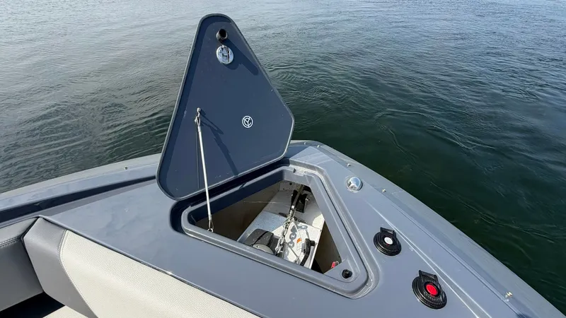 Slide: The Image of Open storage compartment on the 2023 Cruisers Yachts 42 GLS. - 34