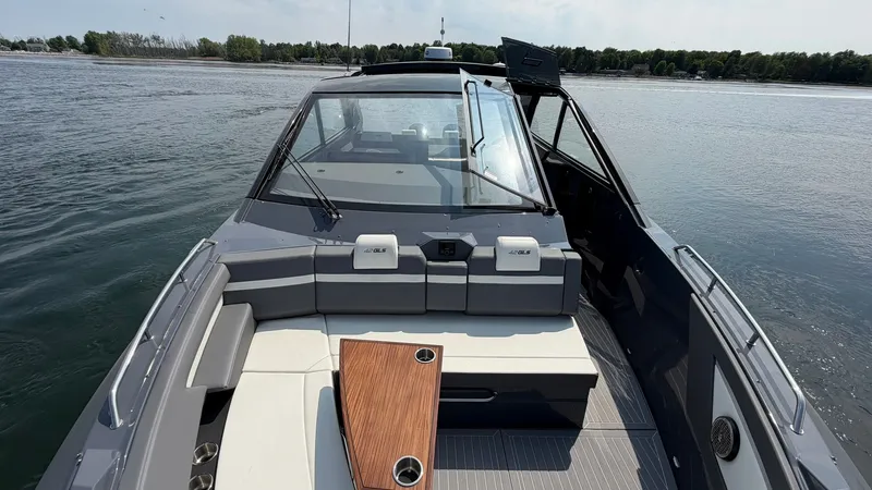 Slide: The Image of 2023 Cruisers Yachts 42 GLS on calm water. - 36