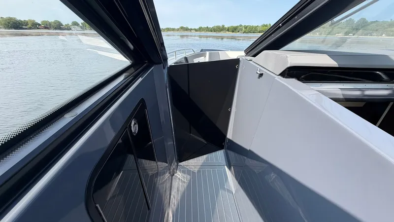 Slide: The Image of Interior view of 2023 Cruisers Yachts 42 GLS on water. - 38