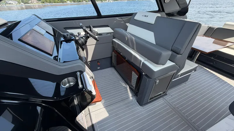 Slide: The Image of Interior of 2023 Cruisers Yachts 42 GLS on the water. - 42
