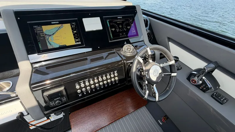 Slide: The Image of Cockpit of 2023 Cruisers Yachts 42 GLS with modern navigation. - 43