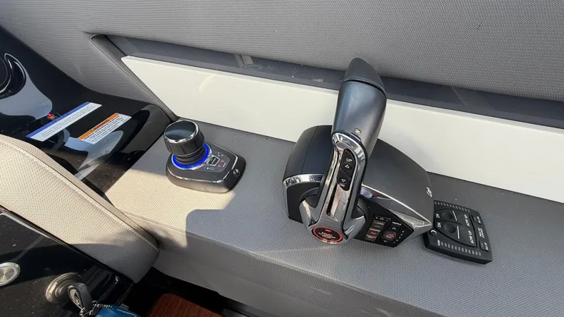 Slide: The Image of Control console of the 2023 Cruisers Yachts 42 GLS. - 44