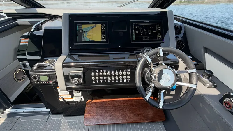 Slide: The Image of Cockpit of 2023 Cruisers Yachts 42 GLS with modern navigation. - 45