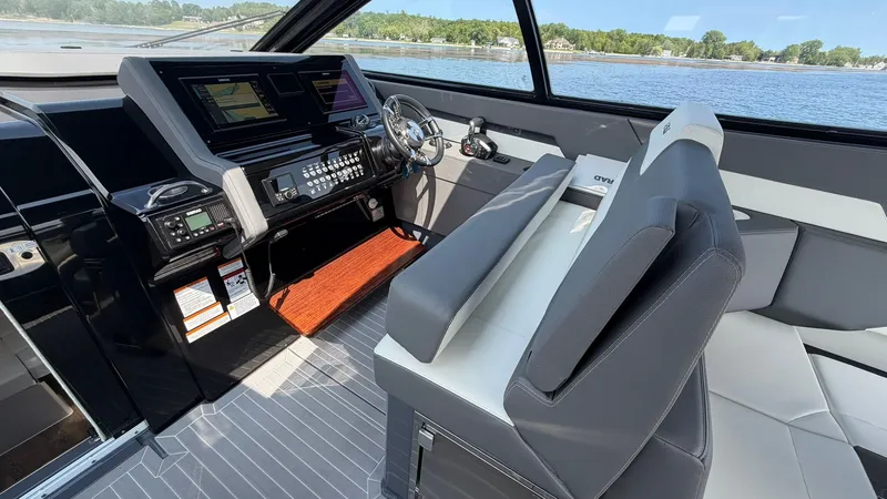 Slide: The Image of Interior of 2023 Cruisers Yachts 42 GLS with helm console. - 46
