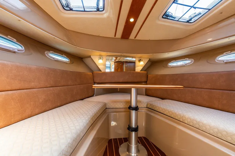 Slide: The Image of Luxurious interior of a 2015 Cutwater 28 boat with elegant seating and skylights. - 10