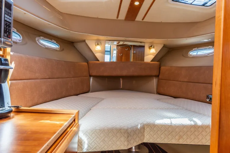 Slide: The Image of Interior of 2015 Cutwater 28 boat with cozy cabin and modern amenities. - 11
