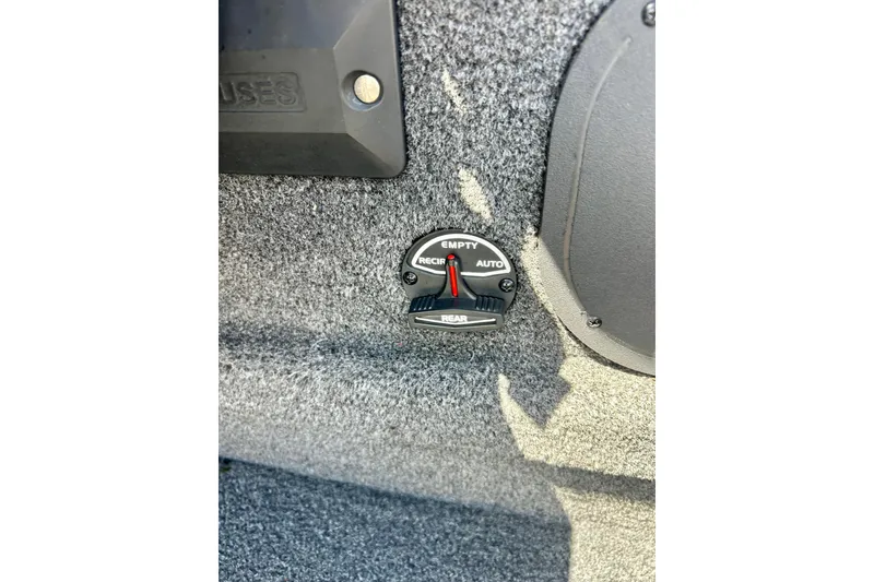 Slide: The Image of Control panel on 2017 Triton 18 C TX boat, featuring empty and auto settings. - 22