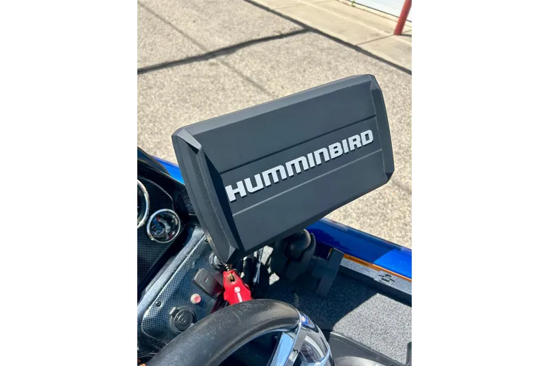 Slide: The Image of Humminbird fish finder on 2017 Triton 18 C TX boat dashboard. - 37