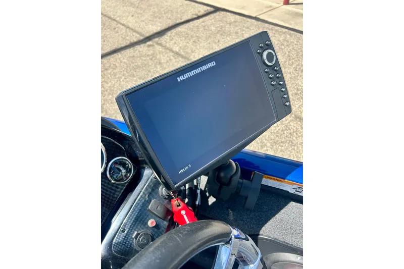 Slide: The Image of Humminbird Helix 9 fish finder on 2017 Triton 18 C TX boat dashboard. - 38