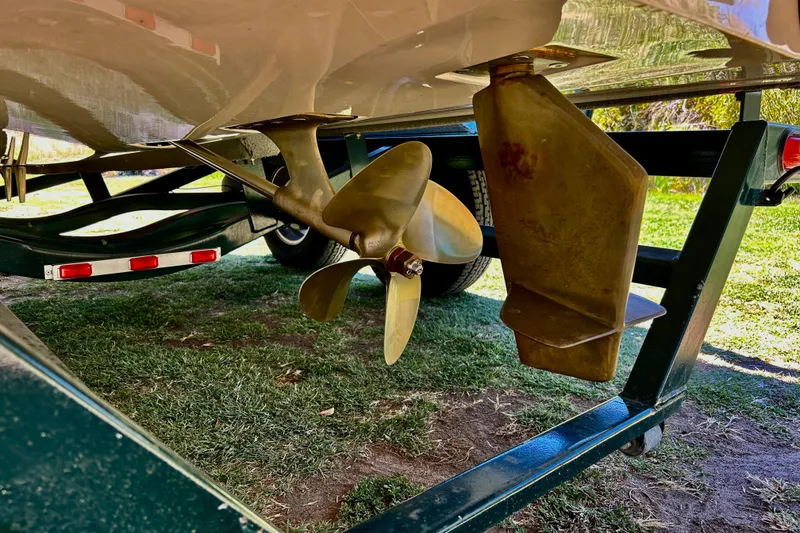 Slide: The Image of Close-up of 2002 MasterCraft ProStar 197 boat propeller and rudder on trailer. - 16