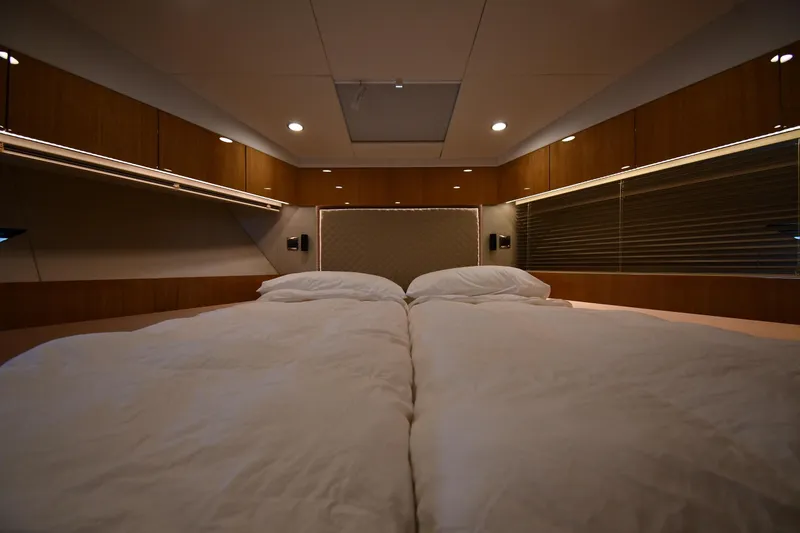 Slide: The Image of Luxurious cabin interior of 2024 Fairline G50 Targa yacht with cozy bedding. - 19