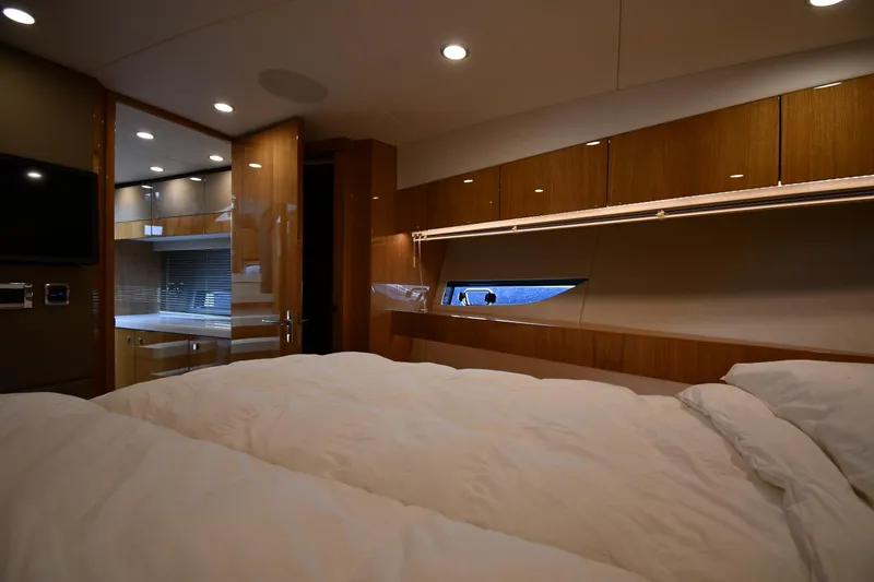 Slide: The Image of Luxurious interior of 2024 Fairline G50 Targa yacht with cozy bedroom and modern amenities. - 23