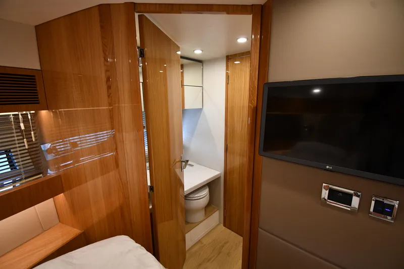 Slide: The Image of Luxurious interior of 2024 Fairline G50 Targa yacht with modern amenities. - 25