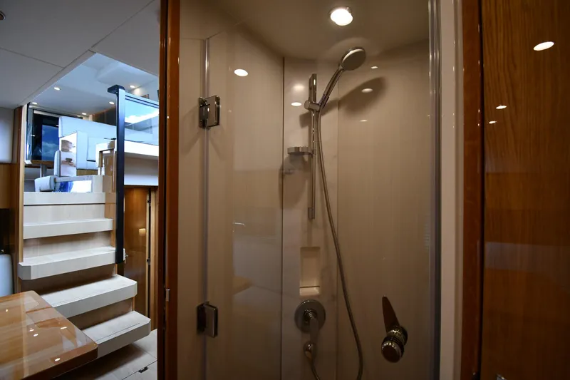 Slide: The Image of Luxurious bathroom interior on 2024 Fairline G50 Targa yacht, featuring modern shower design. - 27