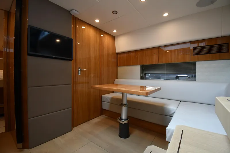 Slide: The Image of Luxurious interior of 2024 Fairline G50 Targa yacht with modern seating and sleek design. - 30