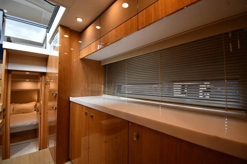 Slide: The Image of Luxurious interior of 2024 Fairline G50 Targa yacht with wood finishes and modern design. - 32