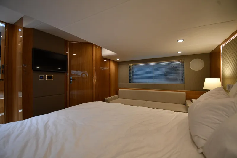 Slide: The Image of Luxurious interior of 2024 Fairline G50 Targa yacht with modern furnishings and ambient lighting. - 40