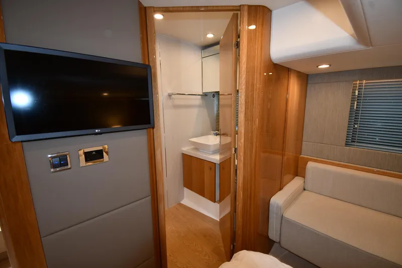 Slide: The Image of Luxurious interior of 2024 Fairline G50 Targa yacht with TV and modern bathroom. - 42