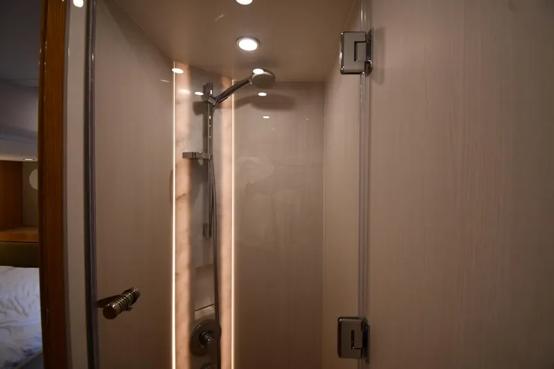 Slide: The Image of Luxurious shower area in 2024 Fairline G50 Targa yacht, featuring modern fixtures and lighting. - 44