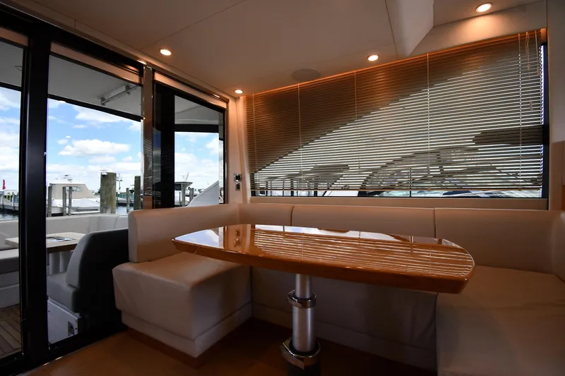 Slide: The Image of Luxurious interior of 2024 Fairline G50 Targa yacht with elegant dining area. - 47