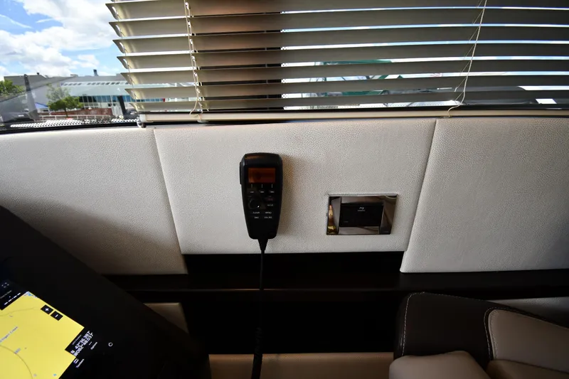 Slide: The Image of Interior of 2024 Fairline G50 Targa yacht with control panel and blinds. - 54