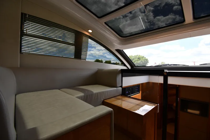 Slide: The Image of Luxurious interior of 2024 Fairline G50 Targa yacht with panoramic windows and sleek design. - 55