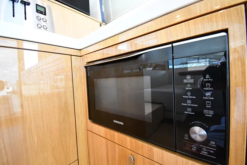 Slide: The Image of Modern kitchen in 2024 Fairline G50 Targa yacht with Samsung microwave. - 59