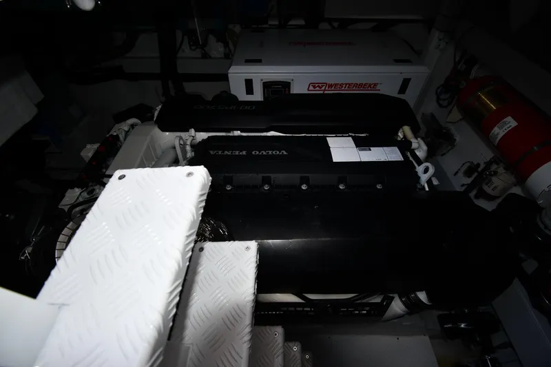 Slide: The Image of Engine room of 2024 Fairline G50 Targa yacht featuring Volvo Penta engine and Westerbeke generator. - 62