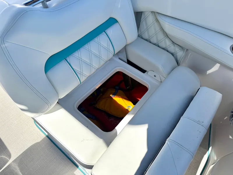 Slide: The Image of Interior of a 2022 Regal LX4 boat with luxurious seating. - 18