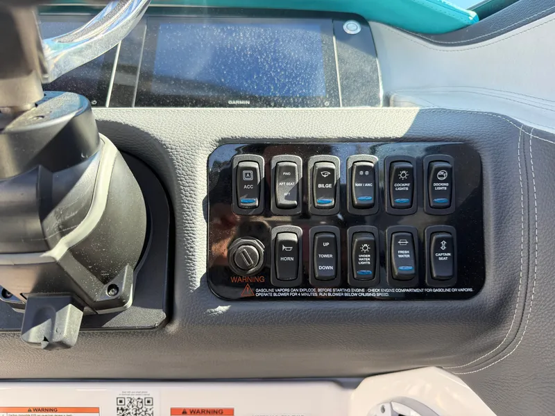Slide: The Image of Dashboard of a 2022 Regal LX4 boat. - 25