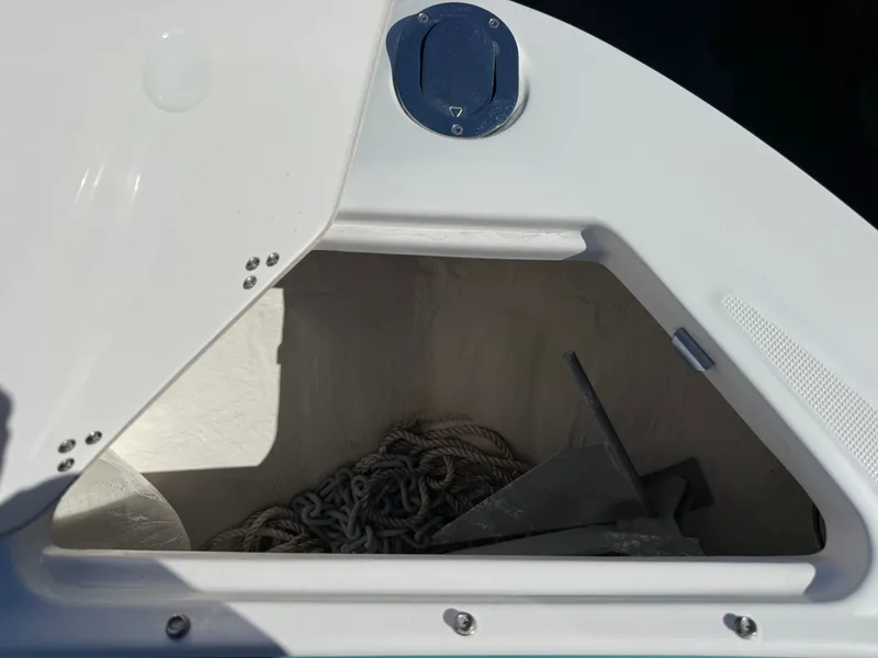 Slide: The Image of Anchor locker of a 2022 Regal LX4 boat. - 44